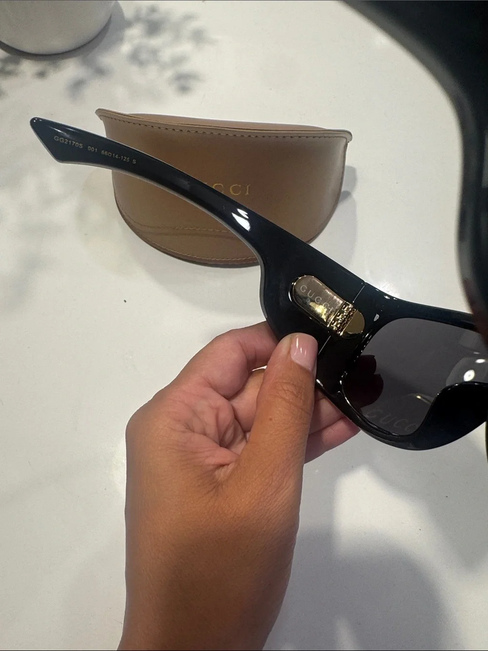 Gucci Black Shield Sunglasses with Gold GG Emblem